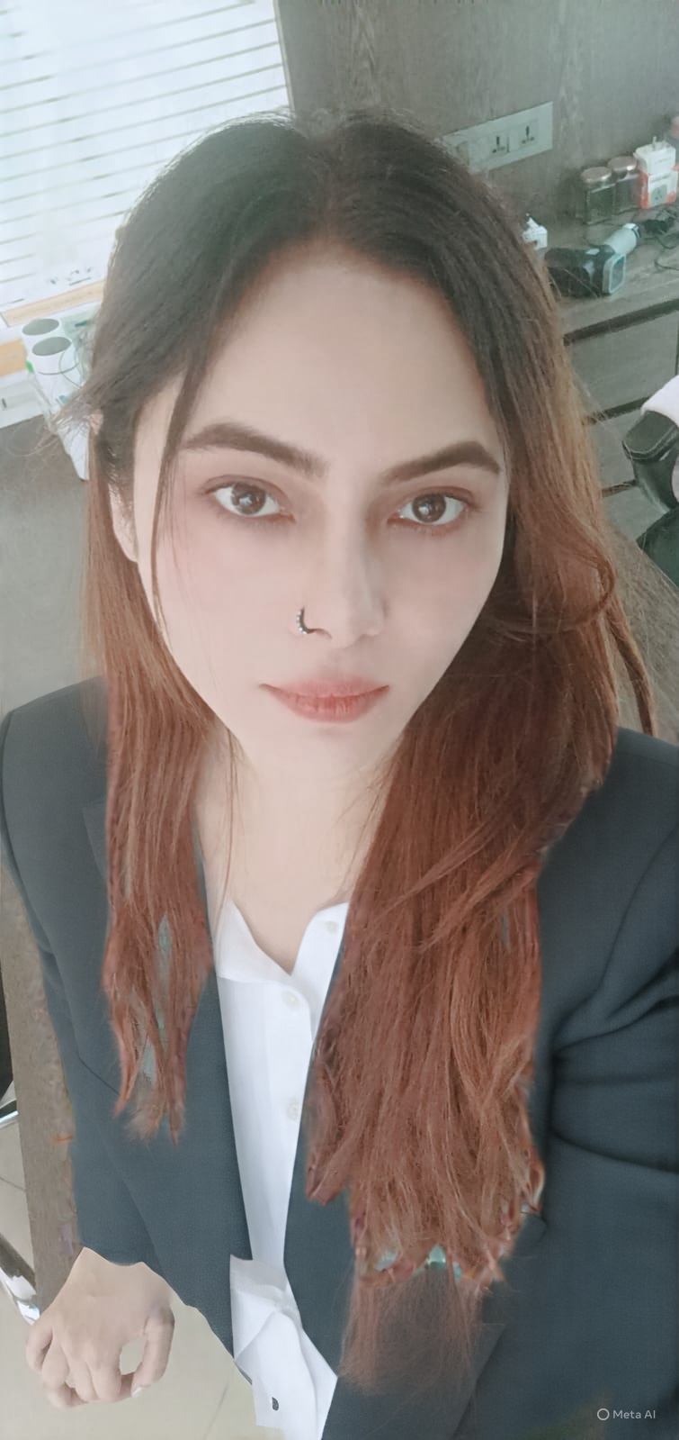Vibha Jain, clinical hypnotherapist in Mumbai, in a professional navy blazer